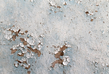 Old wooden background with remains of pieces of scraps of old paint on wood. Texture of an old tree, board with paint, vintage background peeling paint. old blue 