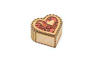 wooden box in the form of a heart on white background