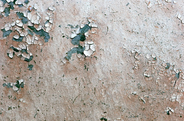 Old wooden background with remains of pieces of scraps of old paint on wood. Texture of an old tree, board with paint, vintage background peeling paint. old blue 