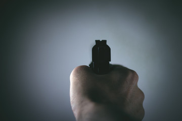 Robber With Gun Threatening Someone To