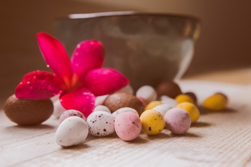 Cracked chocolate easter eggs in a ceramic bowl