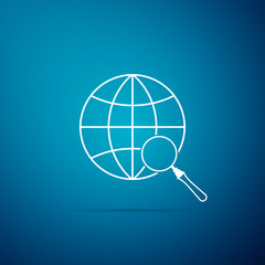 Magnifying glass with globe icon isolated on blue background. Analyzing the world. Global search sign. Flat design. Vector Illustration