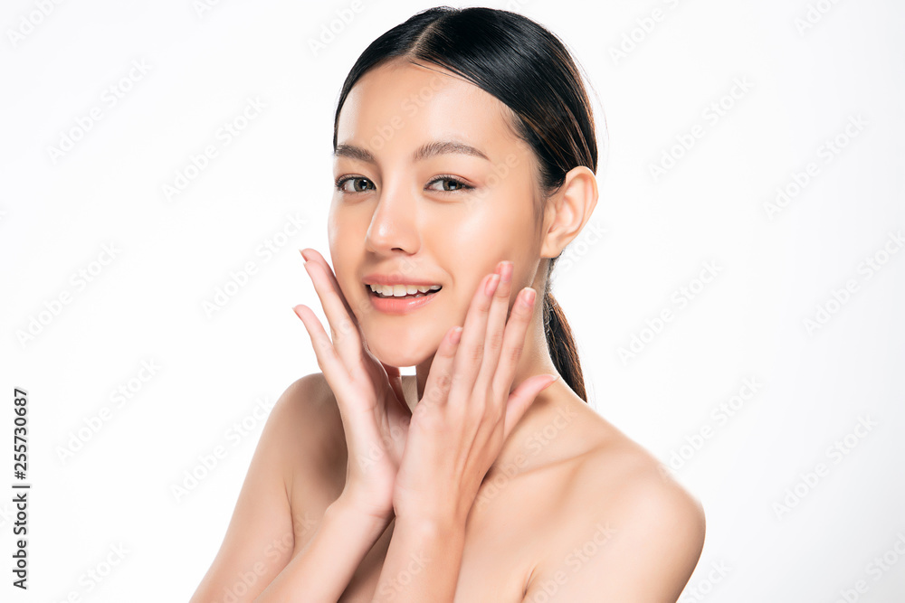 Wall mural beautiful young asian woman with clean fresh skin