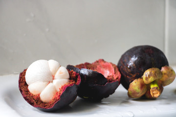 Fresh ripe mangosteen isolated on white background with clipping path.