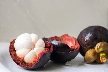Fresh ripe mangosteen isolated on white background with clipping path.
