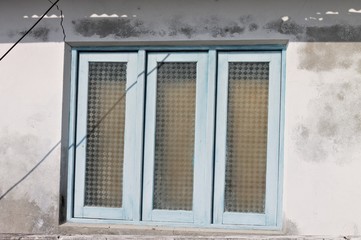 Three windows in a broken wall (Ari Atoll, Maldives)