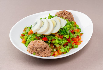 salad in a white plate