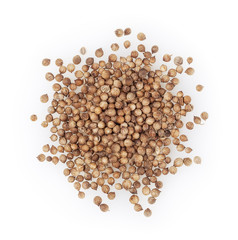 Heap of dried coriander seeds isolated on white background