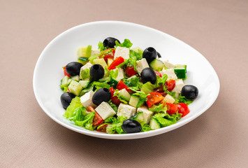salad in a white plate
