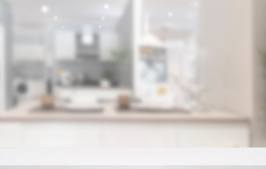 Empty white top table in kitchen room.