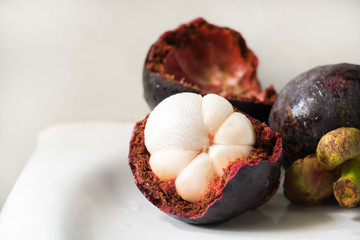 Fresh ripe mangosteen isolated on white background with clipping path.