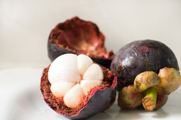 Fresh ripe mangosteen isolated on white background with clipping path.