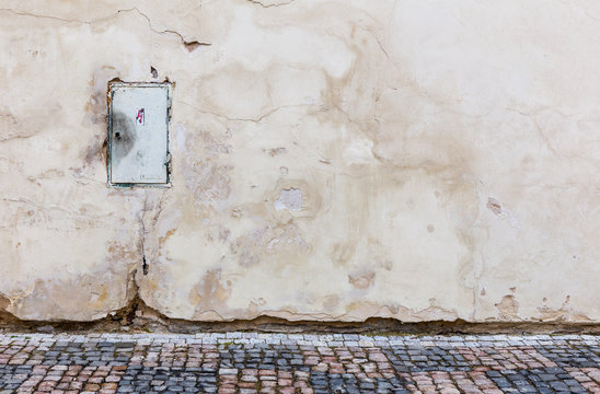 Electricity box on a dilapidated wall in the old town of Prague, Czech Republic