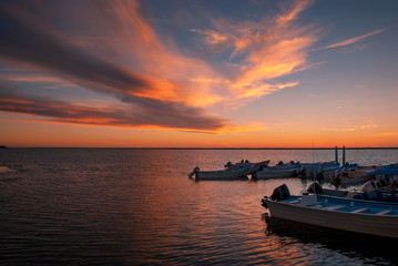 Fototapeta na wymiar A fiery sunset at Adolfo Lopez Mateos on the Pacific coast of Baja California in Mexico
