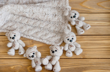 Knitted beige bears and hares 