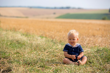 Baby boy in plain field in France