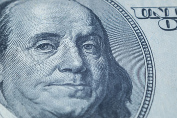 Portrait of Benjamin Franklin from 100 dollars bill.