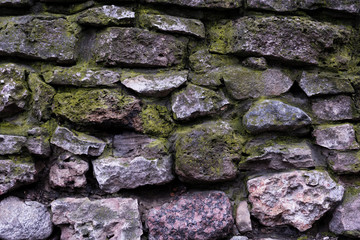 old stone wall with moss
