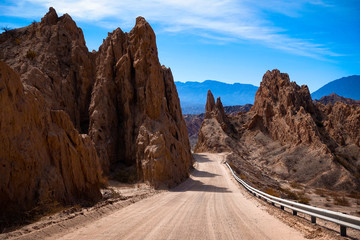 Argentina. The dust road of ruta 40 between Cachi and Cafayate. The road cuts through the quebrada de las Flechas in the Salta region. 