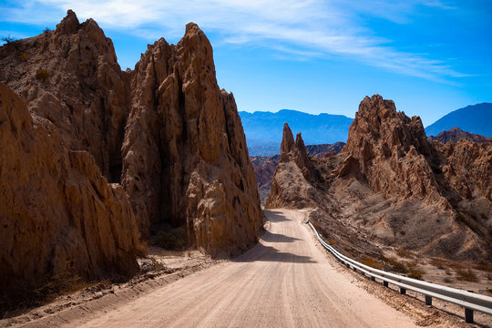 Argentina. The dust road of ruta 40 between Cachi and Cafayate. The road cuts through the quebrada de las Flechas in the Salta region. 