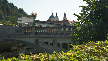 View of Dragon bridge over Ljubljanica river, sunny day, Ljubljana, Slovenia
