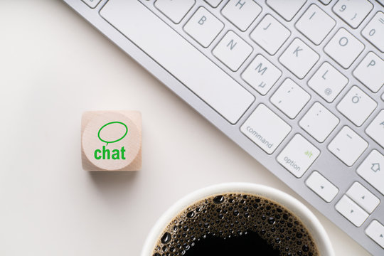 digital workspace with a cube and the symbol for "chat" 