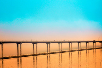 Hood Canal Bridge with Orange and Teal Sunset
