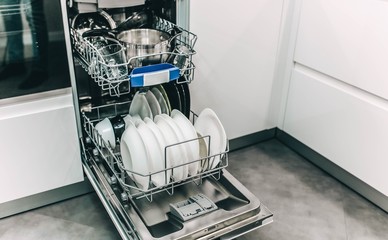 ceramic dishes in a modern dishwasher