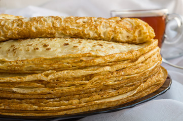 Russia, Severodvinsk, a stack of homemade Russian pancakes, close-up. The Concept of a Holiday Maslenitsa
