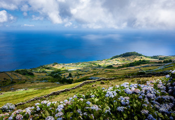 Fototapeta na wymiar Portugal, the Azores. View on the eastside of Corvo island and the atlantic ocean.