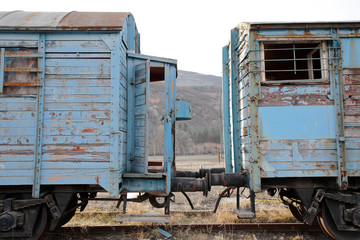 Old train wagons in an abandoned station