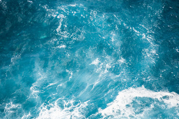 Fototapeta na wymiar Waves splashing at the shore of Flores island, the Azores.