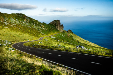 Azores landscape: Endless curvy winding road through the hills of Flores island, the Azores,...