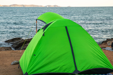 Spread tents by the sea