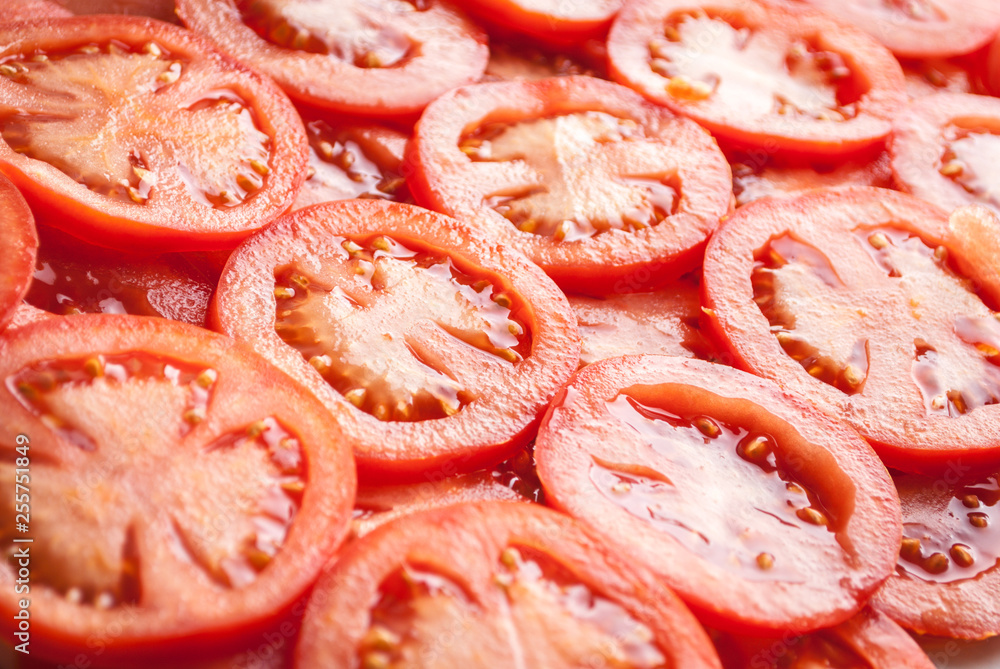 Wall mural slices of tomato. tomato slices background.