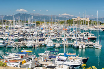 Fototapeta na wymiar View on Port Vauban in the French town of Antibes with Fort Carre in the background