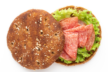 Sandwich with ham sausage on white background.