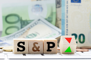 S&P, Standard and poor’s rating adjustment concept, with euro banknotes in background