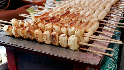row of grilled banana on hot oven