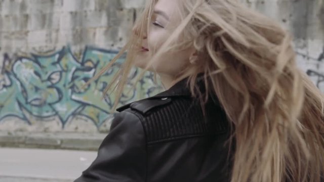 Happy girl. Woman whirl. Slow motion. Rome. Italy.