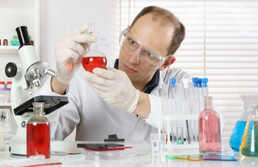 A young scientist conducting research in a laboratory