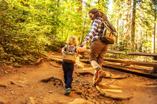 Mother with toddler visit Yosemite national park in California, USA