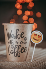 Cup of coffee on table with bookeh background