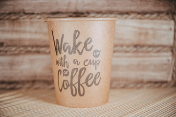 Cup of coffee on table with bookeh background