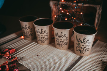 Cup of coffee on table with bookeh background