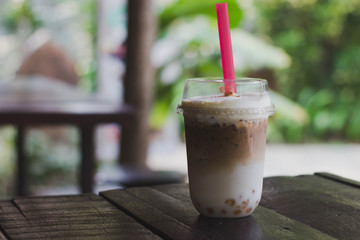 Cold cocoa on a wooden table