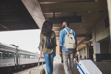 Afro-american guy and girl going on trip