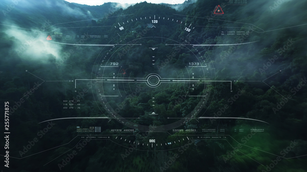 Leinwandbilder Aerial view from the fighter plane's cockpit flying over the low cloud cover mountain scape with head up display acquire targets and enemies location hidden in the dense mountain forest