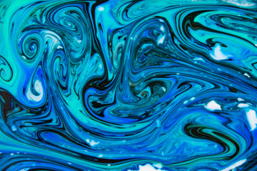 Beautiful abstract painting techniques drawing Ebru .Turkish style of painting Ebru on water with acrylic paints twists the waves.A stylish combination of natural luxury.Contemporary art of marming 