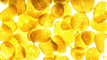 Crispy chips flat-lay on white background, cooking process, junk food concept